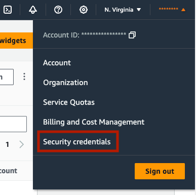 User dropdown menu in AWS Console with several options including “Security Credentials”