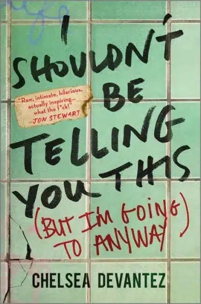 Book cover of a green tile wall with words written over it in black and red marker.