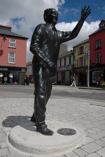Statue of playwright John B Keane, in Listowel, County Kerry