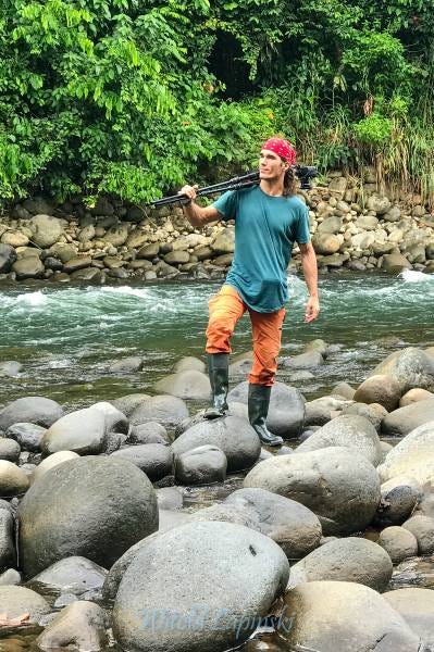 Witold Lapinski on the rocky shore of Sarapiquí river in Costa Rica.