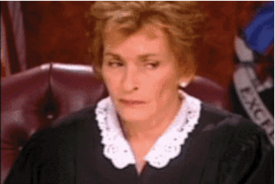 GIF of Judge Judy looking exasperated.