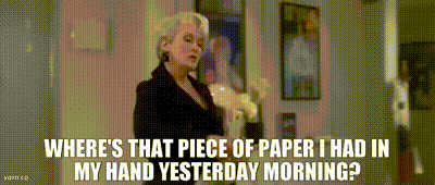 GIF of a scene from The Devil Wears Prada (2006), where Miranda Priestly dumps her designer purse and jacket on her assistant’s desk while demanding “Where’s that piece of paper I had in my hand yesterday morning?”