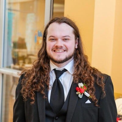 thumbnail for the post titled Alumni Spotlight: Stewart Lovell joins Peraton as web developer