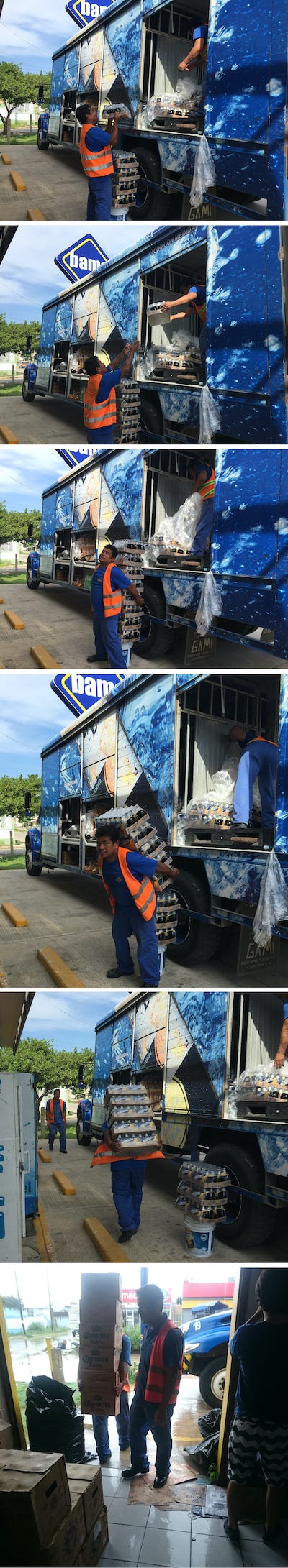 Multiple shots showing workers unload a truck of beer