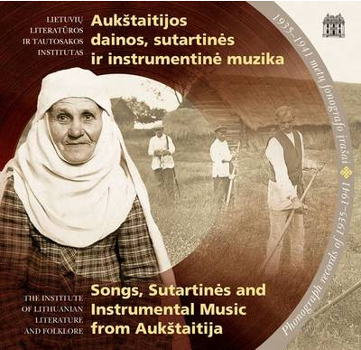 A recording cover of Songs, Sutartinės and Instrumental Music from Aukštaitija with a photo of an older woman in a traditional folk costume with three men in the background