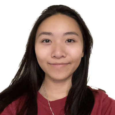 Photo of Linda, an Asian woman, from the chest up. She is looking forward with a closed-lipped smile. She is wearing a silver necklace and a maroon shirt. Her hair falls just below her shoulders.