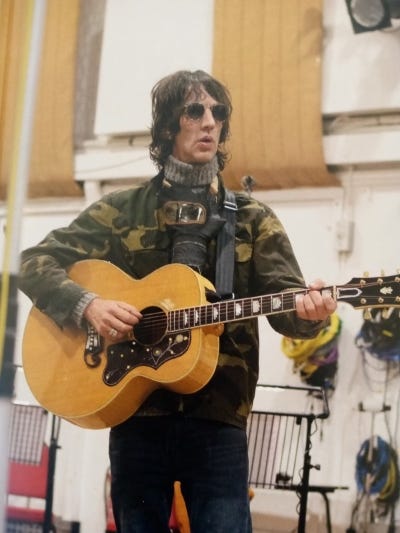 Richard Ashcroft with an acoustic guitar, recording Acoustic Hymns Vol 1 in Abbey Road studios