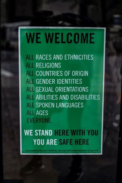 Welcome sign: all races/ethnicities, all religions, all countries, all genders, all orientations, all abilities, everyone