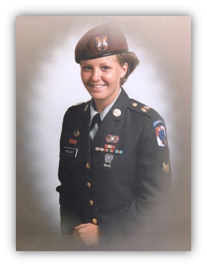 Spc. Karen Gallagher in her dress uniform shortly after returning from Operation Desert Storm.