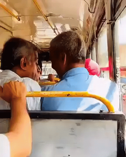 two Indian uncles arguing in a bus