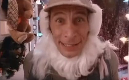 Ernest P Worrell popping in Vern’s door with a Santa beard on and a huge excited look on his face.