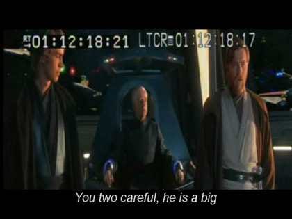 A screengrab from “Star Wars Episode III: Backstroke of the West”, the Chancellor sitting between Anakin and Obi-Wan with the subtitle “You two careful, he is a big”