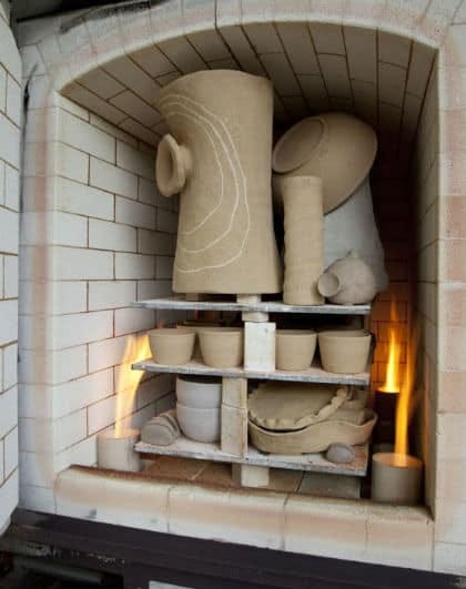 A gas kiln loaded with pottery
