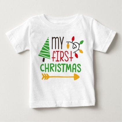 A white t-shirt with “My First Christmas” printed in red and green color.