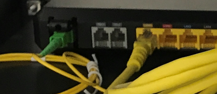 Pic of simplex fibre cable on a consumer gateway router