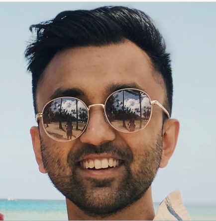 A profile photo of Dilip Rajan with sunglasses