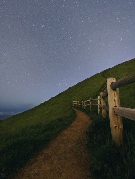 path on a hill — stars visible