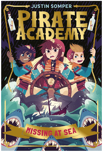 Large book cover. Pirate Academy is in gold leaf at the top of the cover with the author noted above in pale blue. Missing at Sea is picked out in red on a gold banner at the bottom of the page, with 3 sharks snapping at the cast above. Bottles containing clues for the characters to solve during the adventure hang from ropes, one in each corner. Neo and Jacoby hold a rope apiece and stand either side of Jasmine who is front and centre of the cover steering the school ship’s wheel.