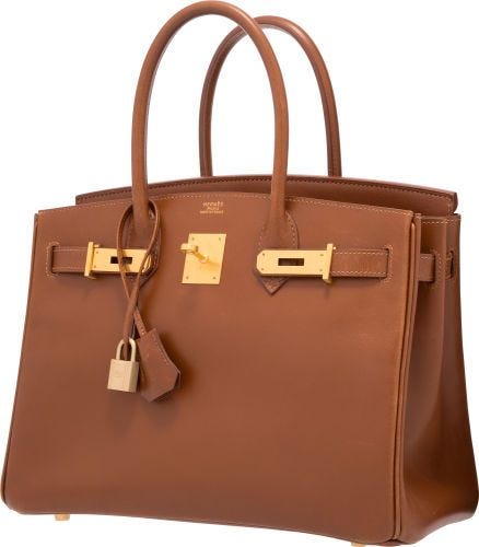 A brown Birkin bag made from Box leather.
