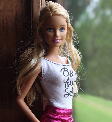 Barbie doll wearing T-shirt