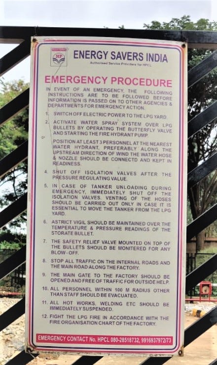 An outdoor poster for security personnel outlining emergency procedures to be followed