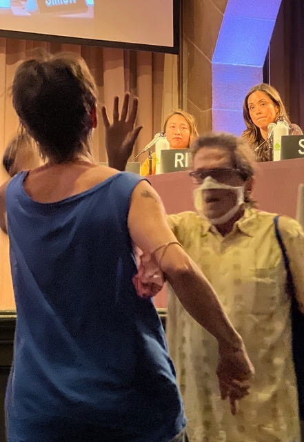 An East River Park activist confronts City Council Member/District 10 Congressional Candidate Carlina Rivera (right) at a forum on environmental issues, July 19, 2022. (The New York League of Conservation Voters Education Fund and The Cooper Union).