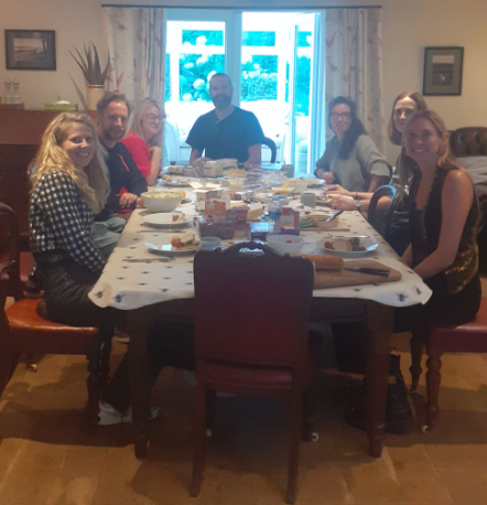 The CAST team around a table having lunch