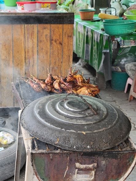 Grilled marinated chicken. Thai street food.