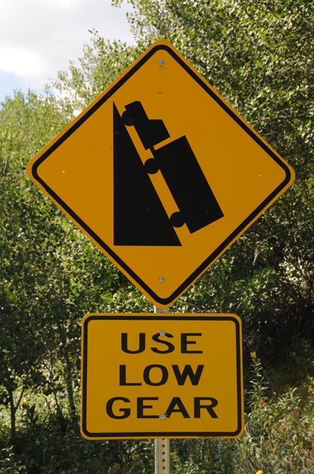 Although they drove in the rough way, the writer and her husband were inspired by this sign by the southern road out of Jarbidge Canyon to instead take the “easy way” north and east through Idaho.