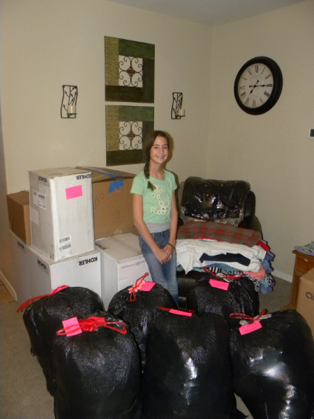 Bags and boxes filled with coats.