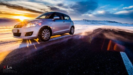 Suzuki Swift on Windy Snowy Roads, Golden Circle, Iceland, 1/100 F14 Iso 640 @17mm
