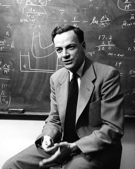 A black and white photo of Richard Feynman.