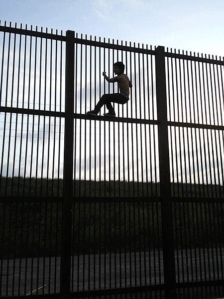 fence border wall child climbing