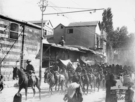 Lieutenant General Sir Harry Chauvel commanding Desert Mounted Corps leads his corps through Damascus on 2 October 1918.