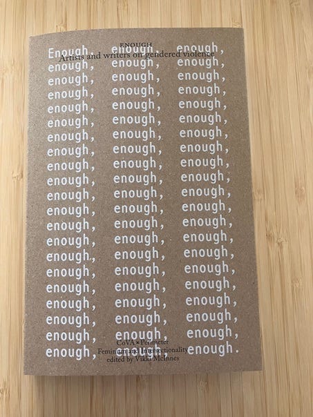 Book with cardboard cover, word ‘enough’ printed repeatedly filling up the whole cover