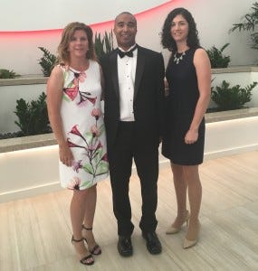 Voorhees resident and attorney Chad Moore, center, stands with his two colleagues, Michelle Haas, left, and Juliann Alicino, right, at the swearing in gala for Moore’s appointment to president of the New Jersey Defense Association.