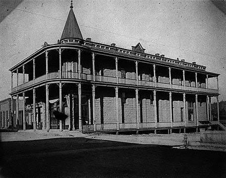 A black-and-white illustration of the Weatherford Hotel, circa 1900