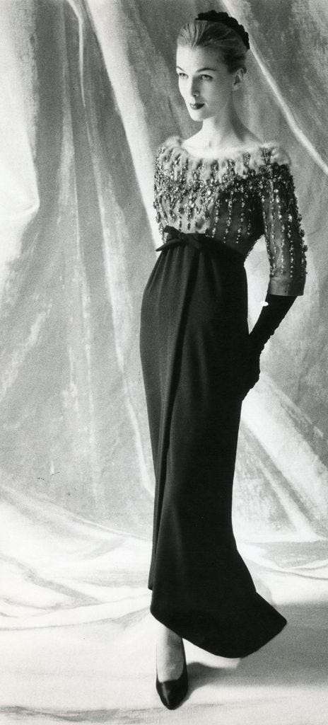 A woman with a slender physique in the Empire dress.