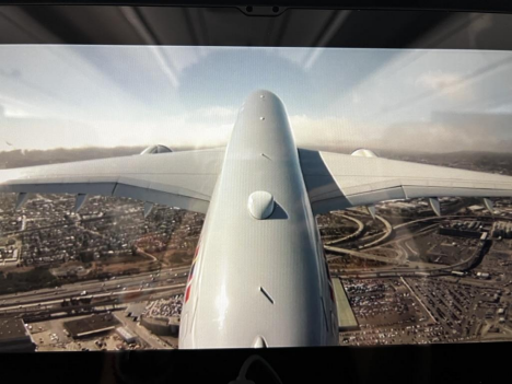 Photo of a plane wing through the window