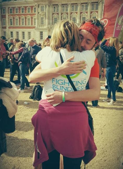 Alex Innes hugging his mother after running the London Marathon