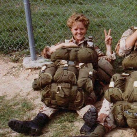 Karen Gallagher, then a paratrooper, preparing for a training jump at Ft. Bragg, NC shortly before deployment.