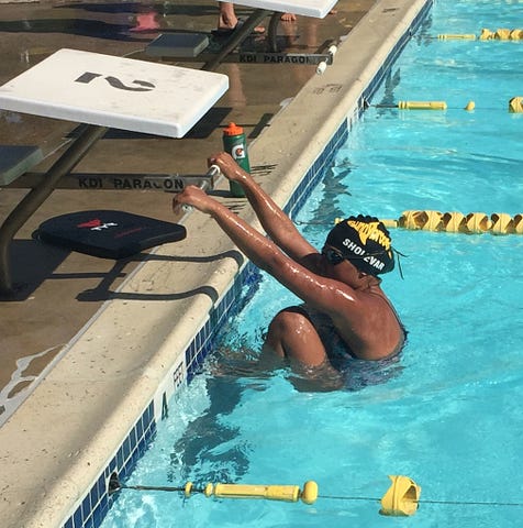 Meera Sholevar preparing to swim at practice at the Sunnybrook Swim Club in Moorestown. She will resume with the Jersey Wahoos in September, for the rest of the year.