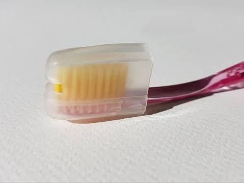 Toothbrush with cap