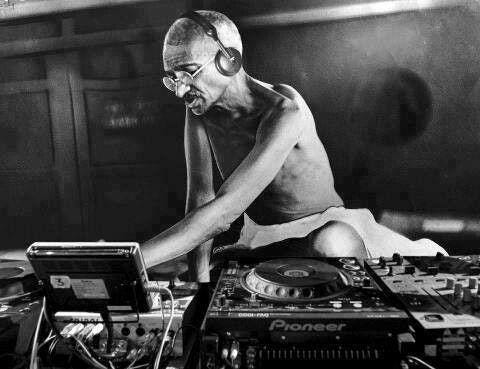 Gandhi being a DJ, Gandhi in front of a DJ booth, MK Gandhi dropping the beat, Photoshop is an incredible thing