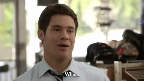 GIF of Adam Demamp from Workaholics saying “Whoo” and looking annoyed.