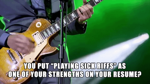 A gif of someone playing guitar. The text reads “You put playing sick riffs as one of your strengths on your resume?”