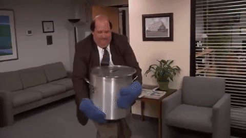 GIF from The Office where Kevin spills a large pot of chili all over the office carpet