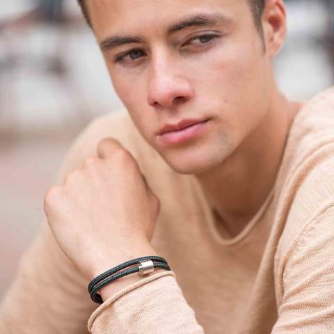 Man wearing corded leather ashes bracelet