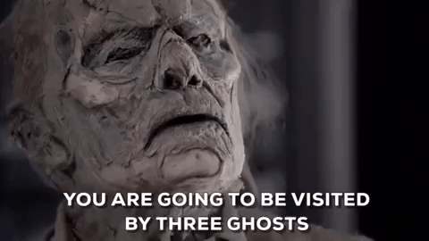 A GIF with a zombie-like character talking with the subtitles: You are going to be visited by three ghosts.