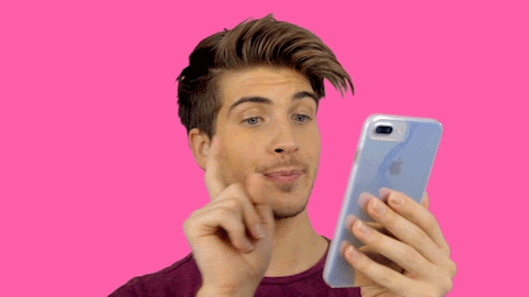 Gif of popular YouTuber Joey Graceffa pressing the follow button on his iPhone.
